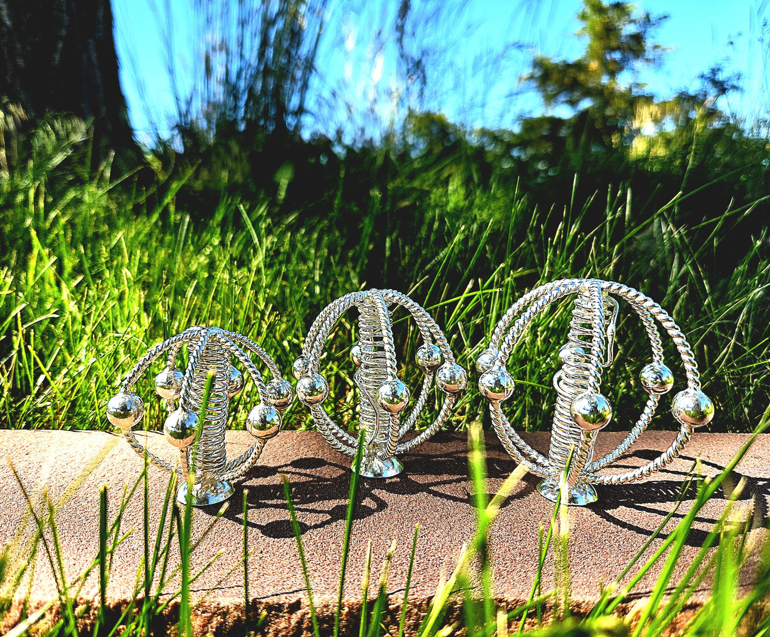 Silver plated harmonizer family in the grass - summer